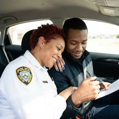 Caucasian Female Police Officer in Heartwarming Moment