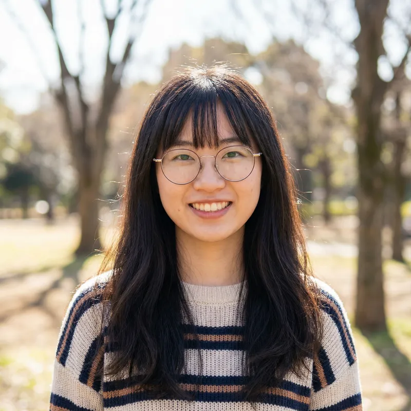 Smiling Asian Girl with Long Hair and Glasses