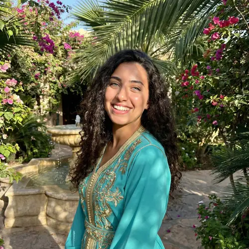 Beautiful Middle-Eastern Teenage Girl with Brunette Hair in Embroidered Gown