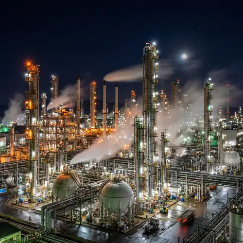 Night View of Chemical Plant: Industrial Complex in Illuminated Splendor
