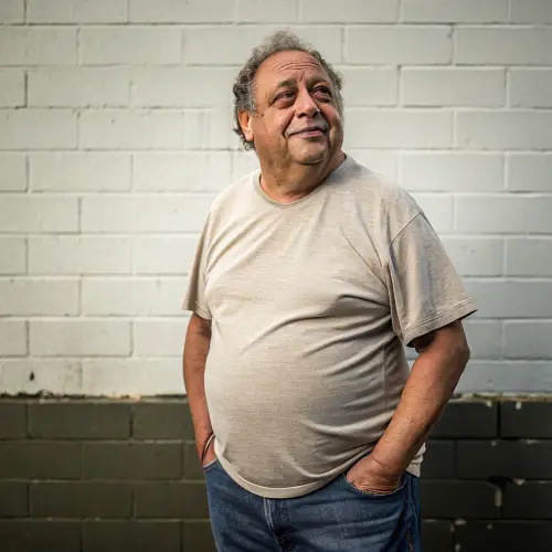 Fat Man with Grey Hair and Crooked Teeth