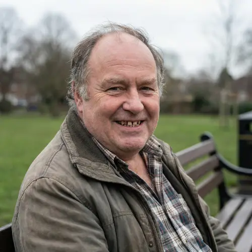 Fat Man with Grey Hair and Crooked Teeth