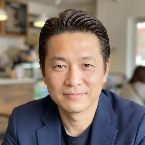 Stunning Asian Man with Monolid Eyes and Slicked-Back Hair