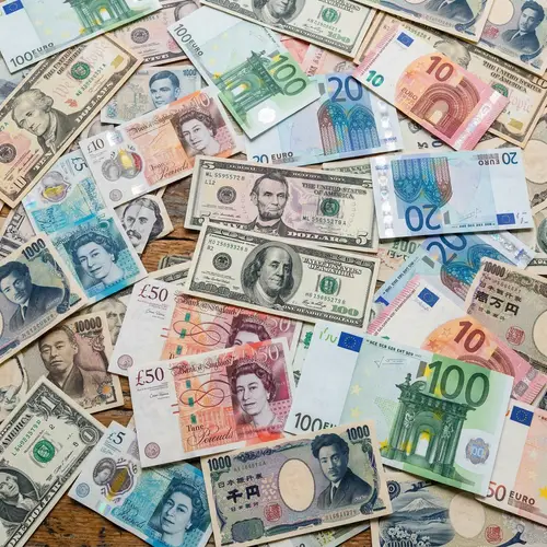 Colorful Currency Background for Financial Themes