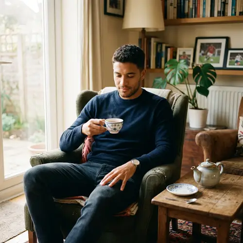 Cristiano Ronaldo Enjoying Tea in a Cozy Living Room