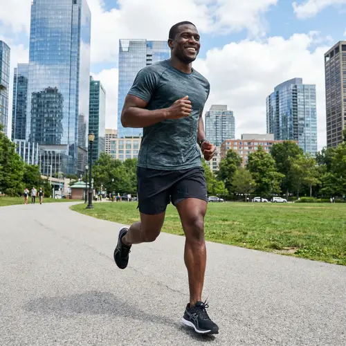 Energetic Jogging in Urban Cityscape | Positive and Determined Runner