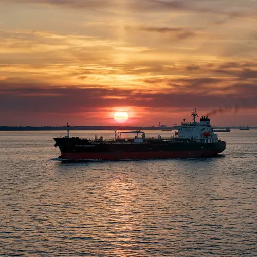 Oil Tanker at Sunset – A Stunning Maritime View