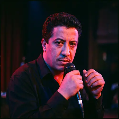 Cheb Hasni: Dramatic Red and Blue Portrait