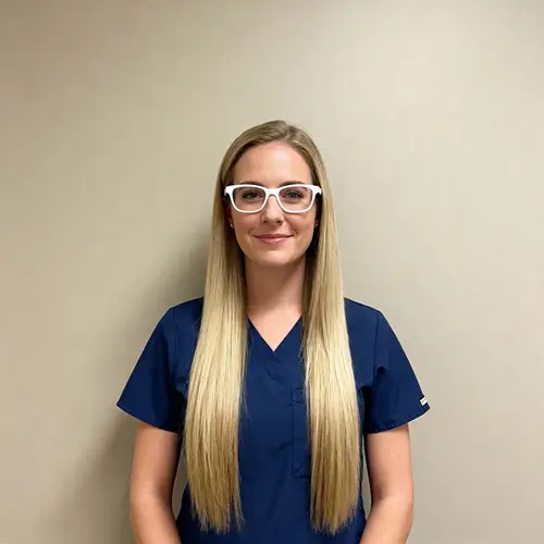 Blue Uniformed Nurse with Blonde Hair