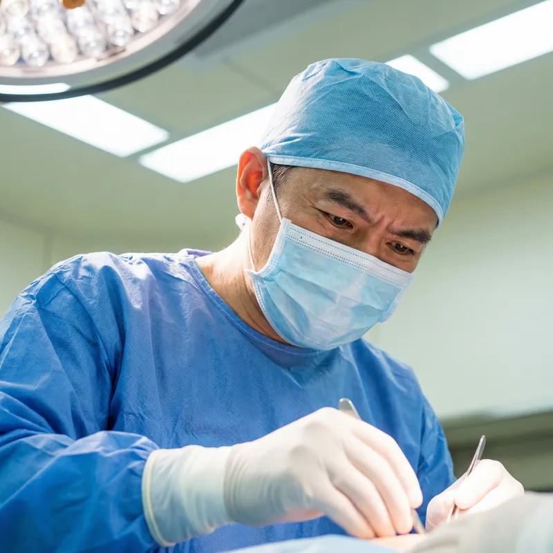 Midlife Surgeon in Surgical Garb | Medical Mask Image