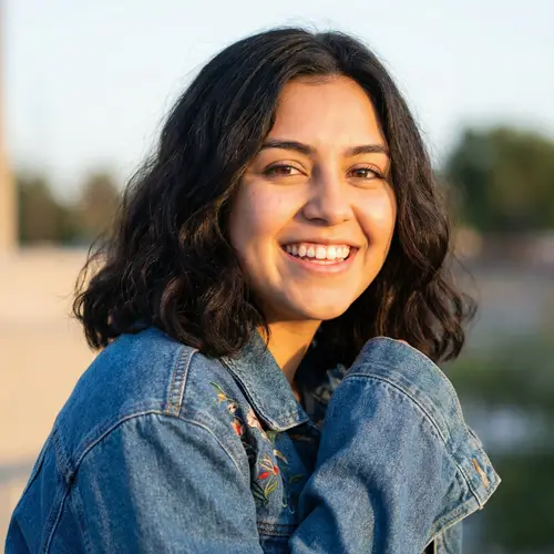 Young Hispanic Woman with Captivating Brown Eyes and Dark Hair