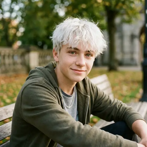Cute 17-Year-Old Boy with White Hair and Green Eyes