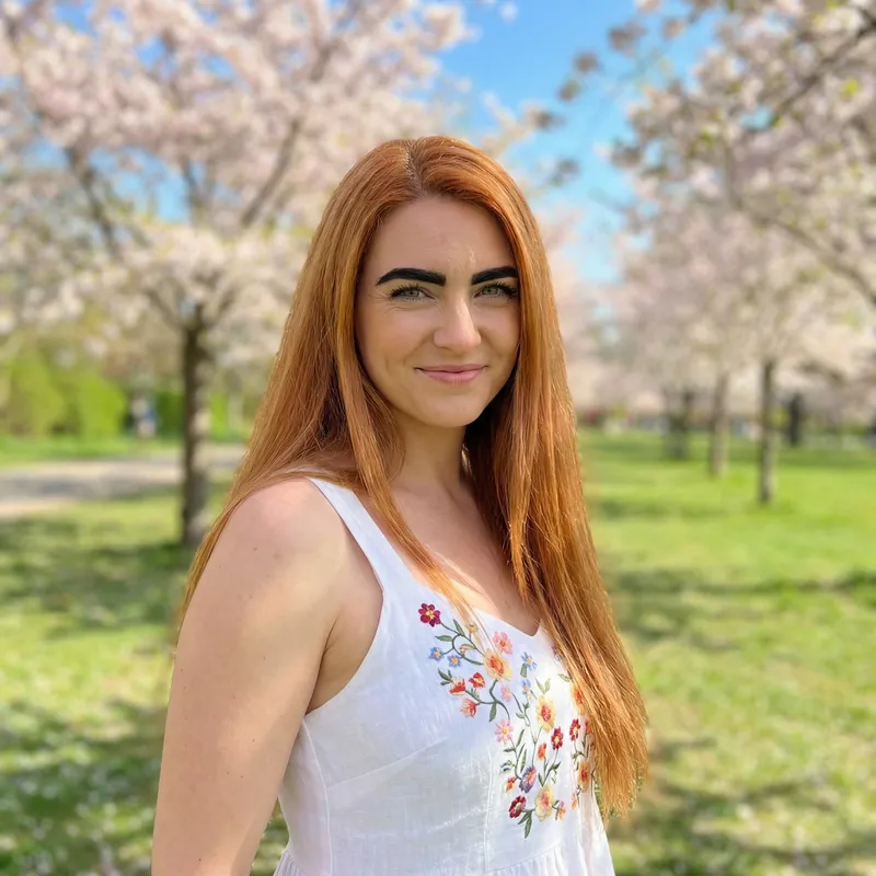 Captivating Copper-Colored Hair Woman with Serene Smile