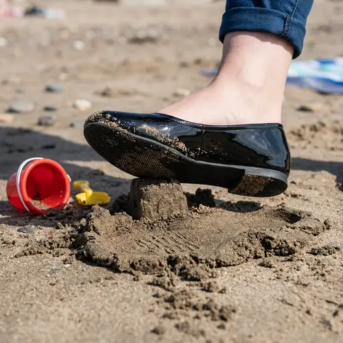 Giant Woman Crushes Sandcastle in Black Flats