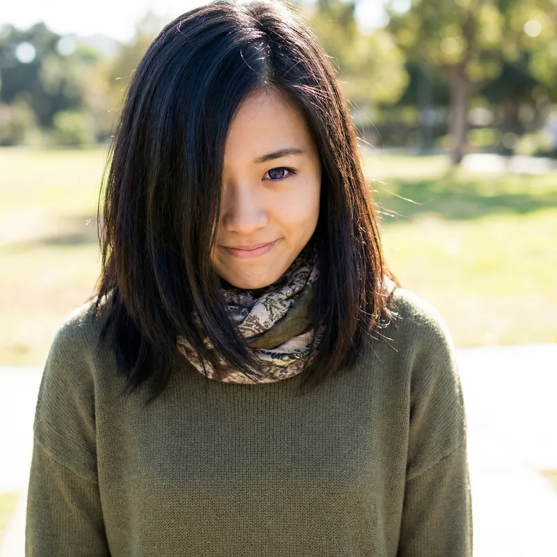 Shy Black-Haired Girl with Pure Purple Eyes