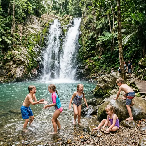 Kids Playing Near a Majestic Waterfall
