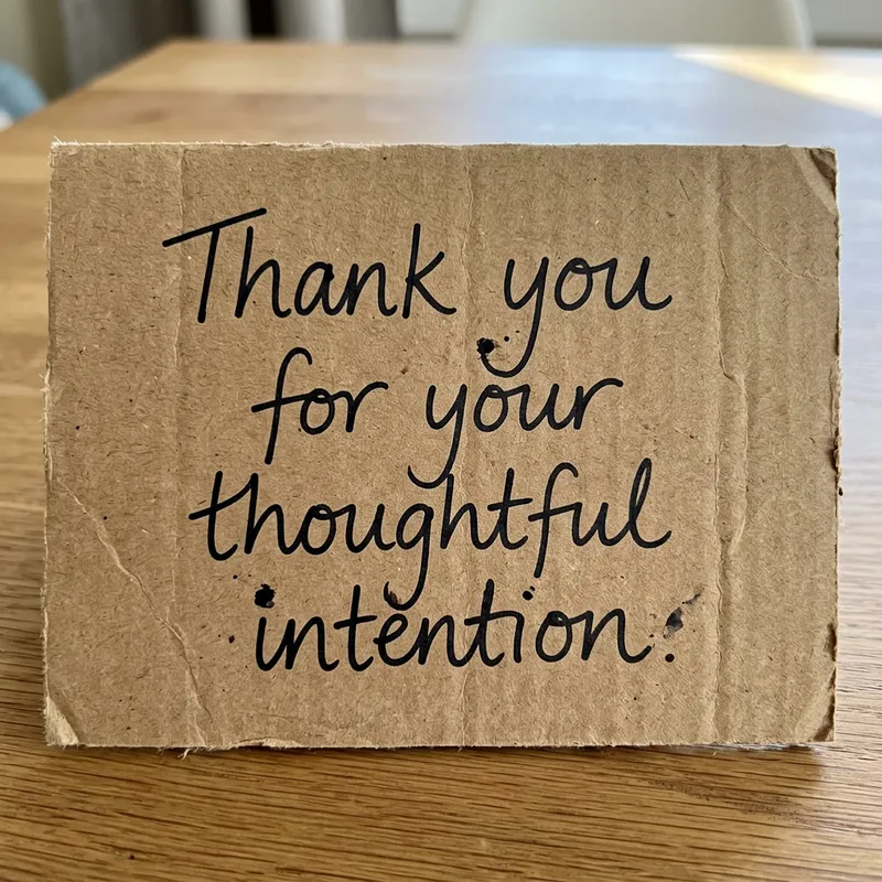 Hand-Written Thank You Note on Cardboard Hand-Written Thank You Note on Cardboard