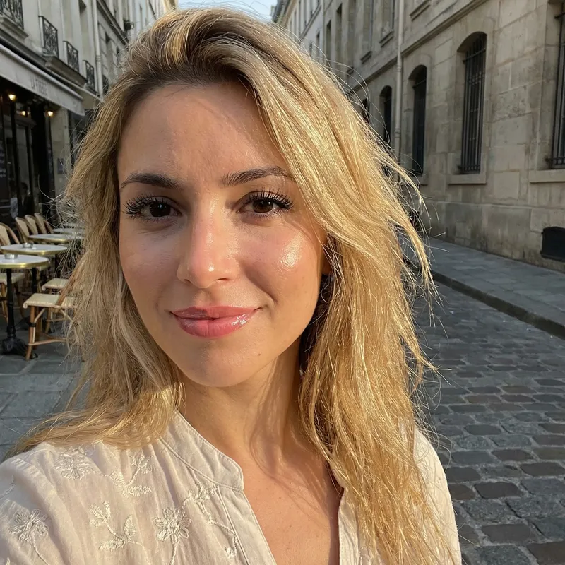 Radiant French Woman with Long Blonde Hair and Mesmerizing Eyes