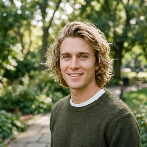 Shaggy Blond Hair & Green Eyes | Clean-Shaven Man