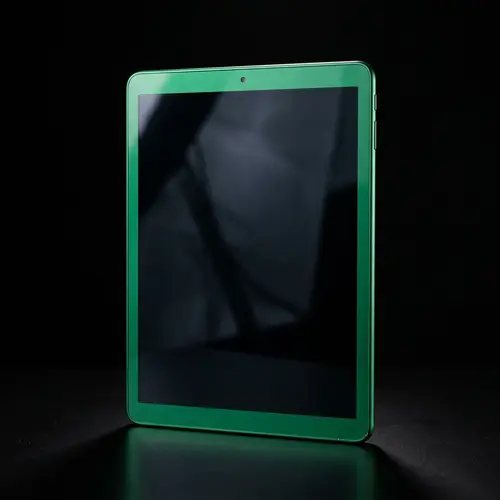 Green Handheld Tablet on Black Background