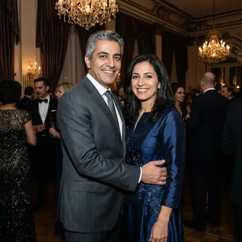 Stylish Middle-Eastern Businessman and Elegant Woman at Classy Event