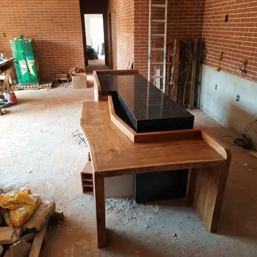 Integrated Stone and Wood Table Design