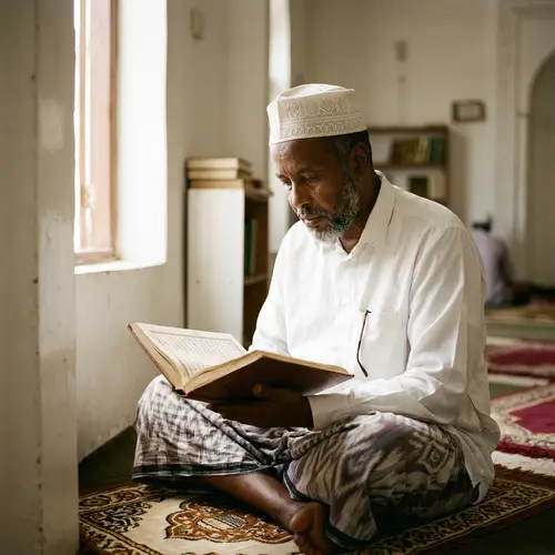 Somali Man Reading the Holy Qur'an | Tranquil Scene
