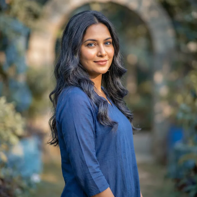 Graceful South Asian Woman with Blue Eyes and Dark Long Hair
