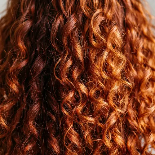 Vibrant Red Hair Textures and Shades | Curly and Lush