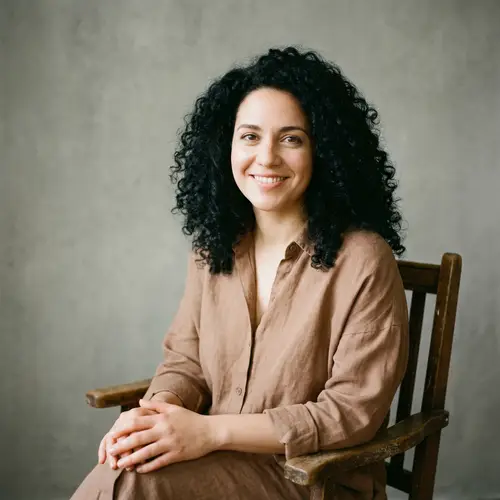 Beautiful Woman with Peach Complexion and Brown Eyes Sitting on Chair