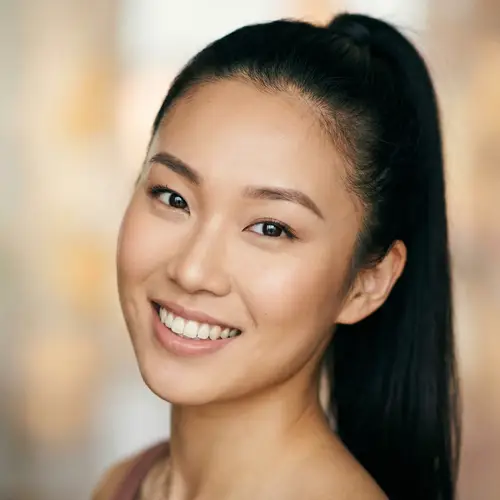 Asian Female Model with Ponytail Hairstyle | Engaging Headshot