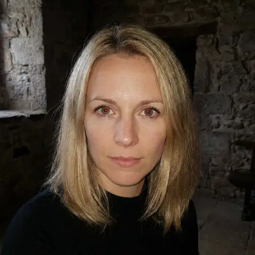 Blonde Woman with Striking Red Eyes