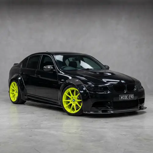 Sleek Black BMW 335i E90 Widebody Modification