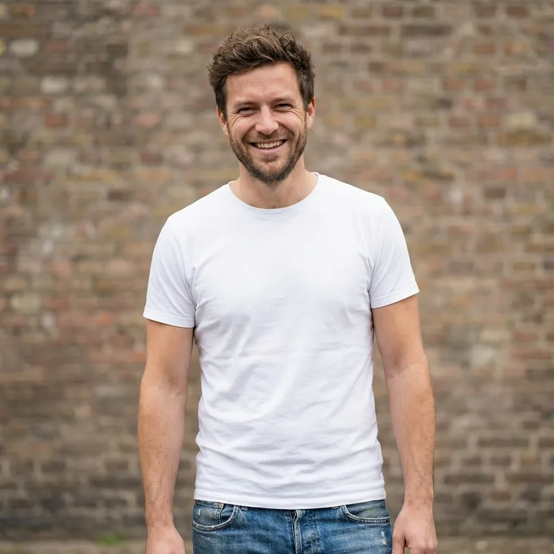 Smiling European Man in Blue Jeans & White Shirt