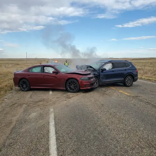 Dramatic Car Crash Scene on Deserted Highway