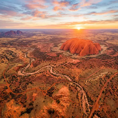 Breathtaking Aerial Shot of Australia's Outback with Uluru
