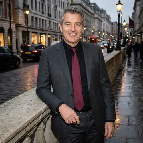 Stylish Man in Dark Grey Suit and Burgundy Tie