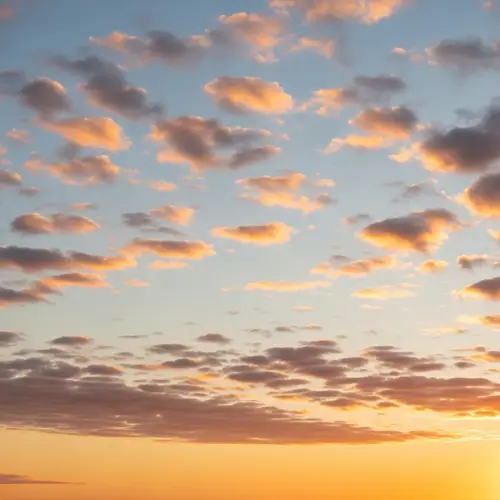 Realistic Sunset Sky with White-Orange Clouds