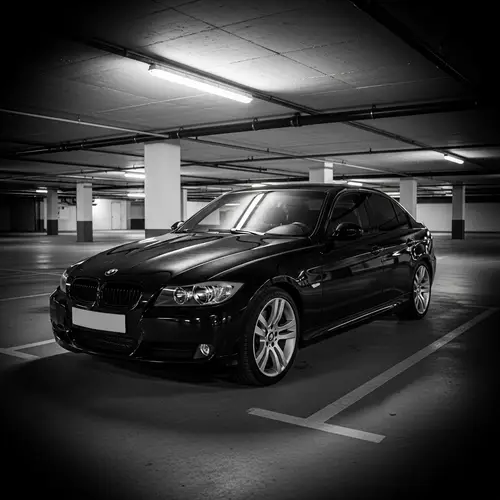 Sleek BMW E90 in Underground Parking Garage - Automotive Photography