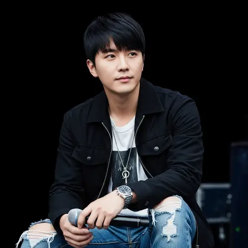 Suga BTS: East Asian Musician in Stylish Black Jacket