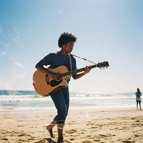 Energetic Young Black Woman Playing Guitar on Sun-Kissed Beach