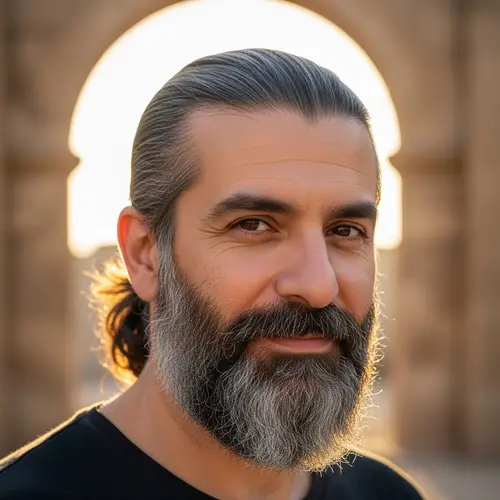 Middle-Eastern Man with Grey and Brown Hair | Matured Look