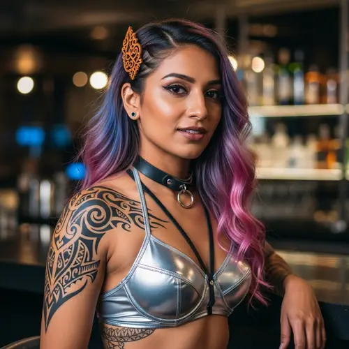 Fashionable South Asian Woman with Pink-Blue Hair and Tribal Tattoo