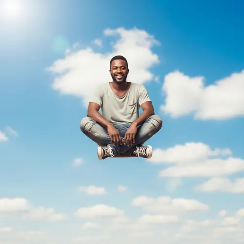 Happy Black Man Sitting Outdoors | Casual Smile in Air