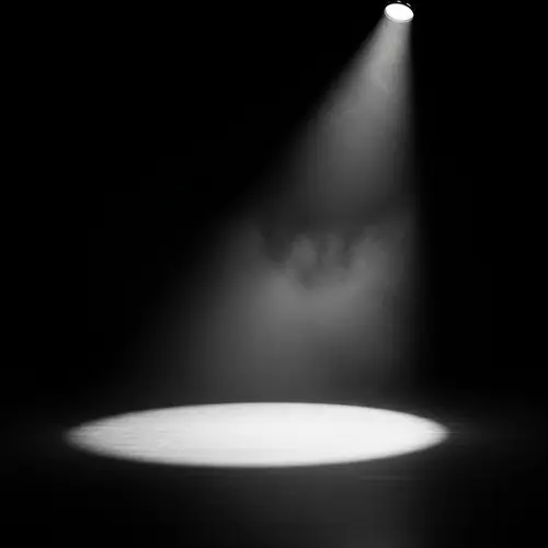 Spotlight Illuminating Dark Stage - Contrast of Light and Shadow