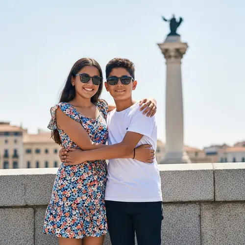 Hispanic Boy and Girl Hugging on Bridge with Pillar Background