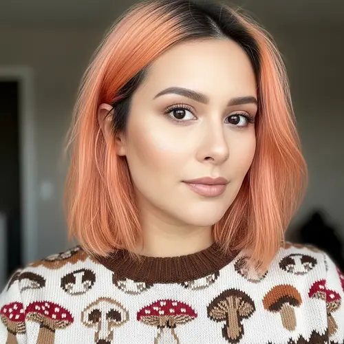 Pastel Orange Hair and Mushroom Sweater Style
