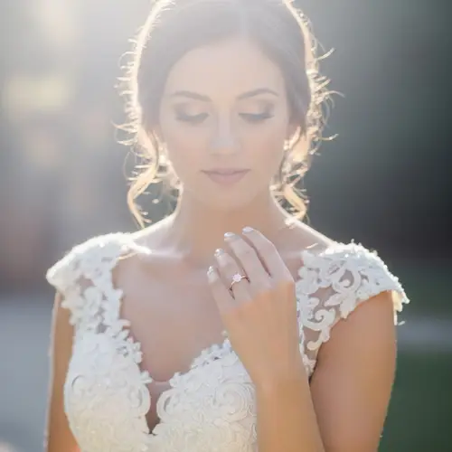 Caucasian Bride with Solitaire Engagement Ring in Dreamy Setting
