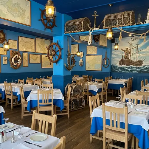 Nautical Themed Restaurant with Azure Hues and Antique Decor