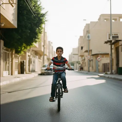 Hassnain's Joyful Bike Ride: A Childhood Adventure